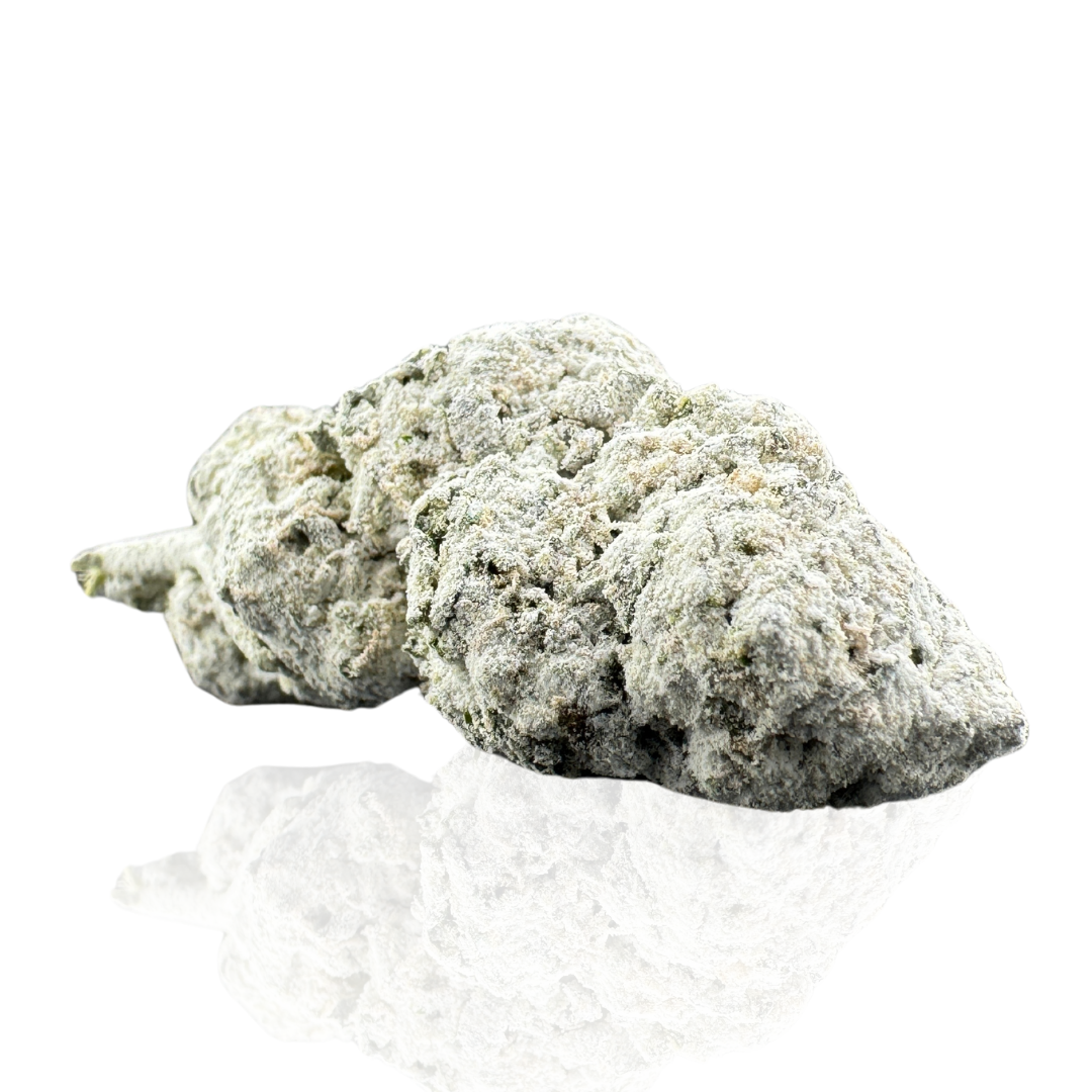 Close-up of a dense cannabis bud covered in sparkling trichomes